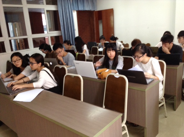 Putting their heads together during the one-child assignment.